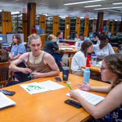 Individuals gathered around a table